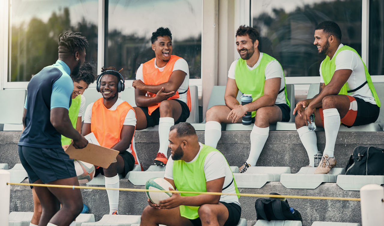 Rugby team, people and coaching strategy, checklist and game event, formation or match planning at stadium. Happy diversity group, sports men and training manager for goals, discussion and mission; Shutterstock ID 2278819349; purchase_order: POIIG0004097; job: OMG1193295; client: Danone UK; other: 480